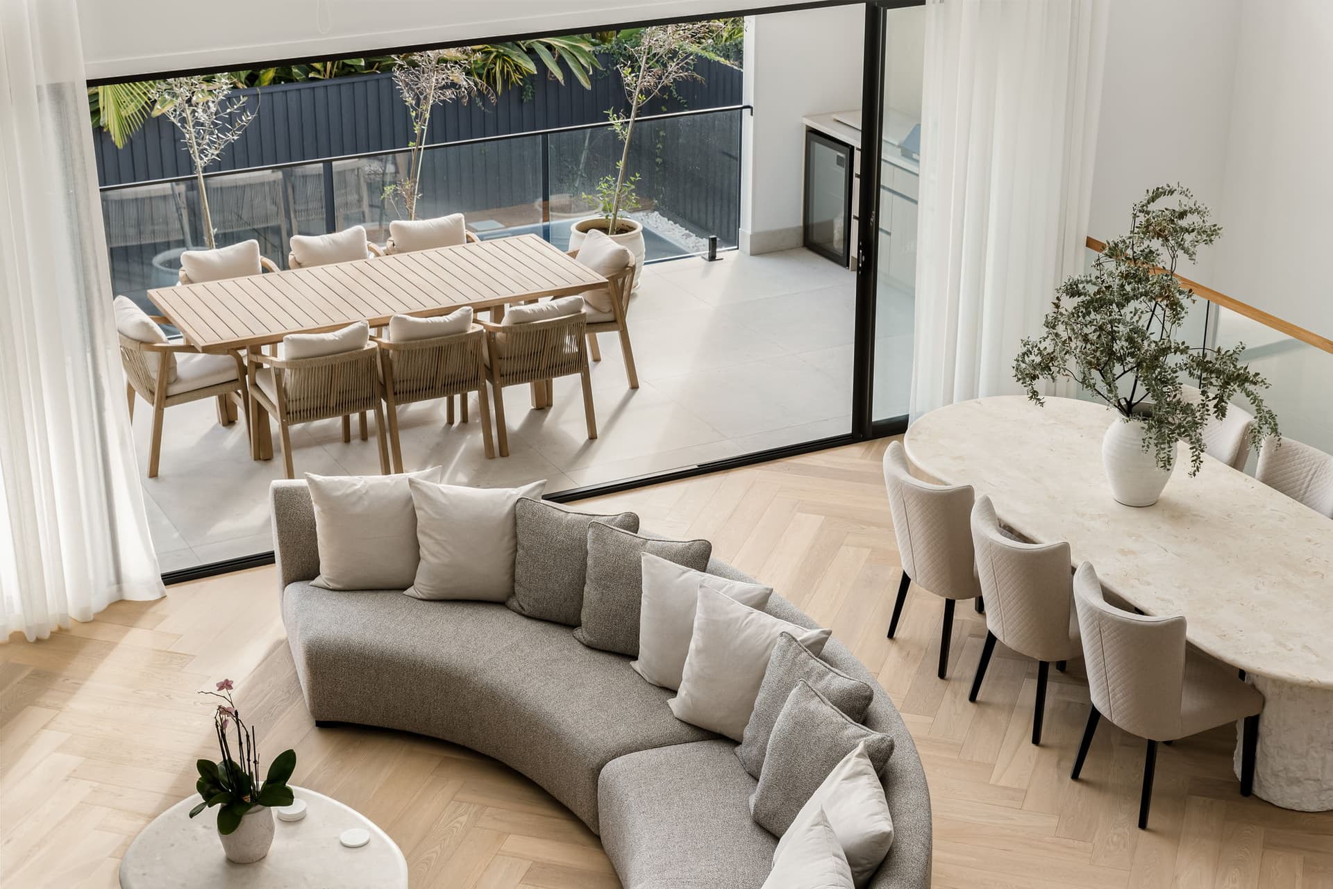 Living opening to terrace and pool